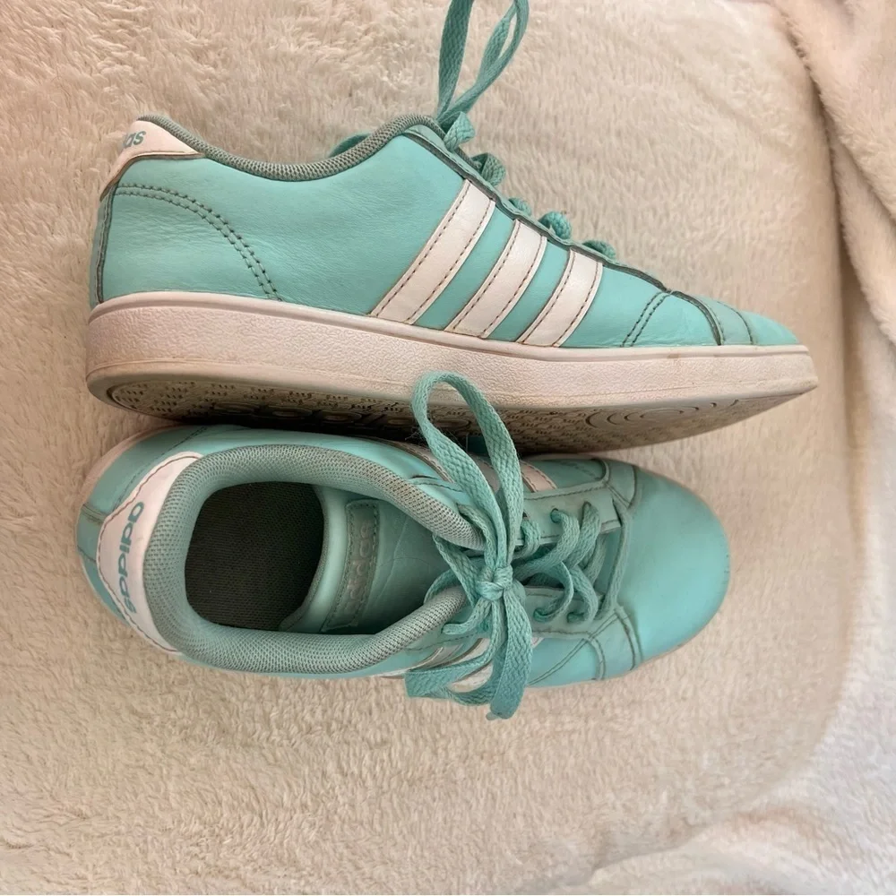 Adidas teal blue kids sneakers with white stripes, size 4, preowned
